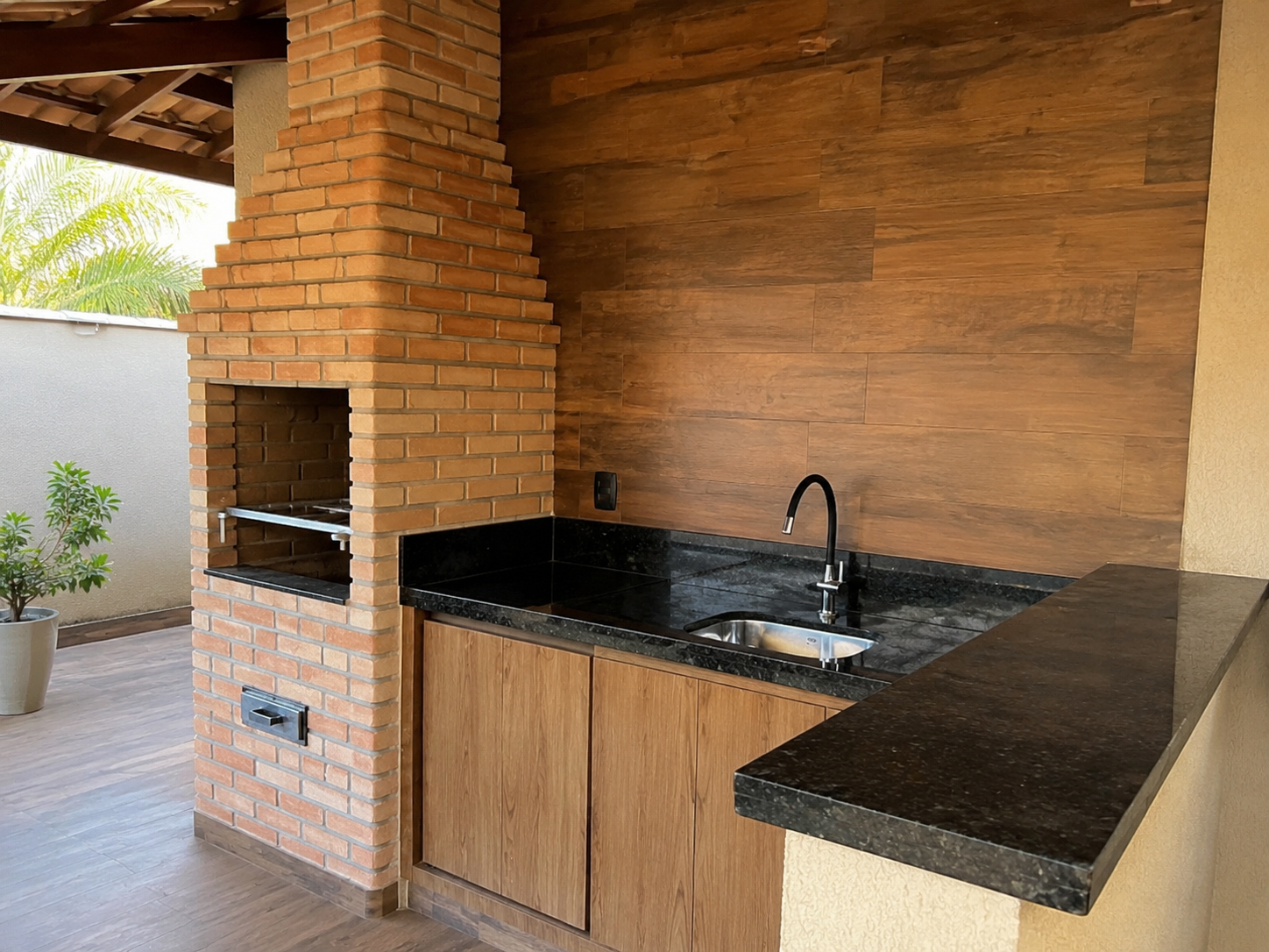 Área gourmet com bancada de pedra